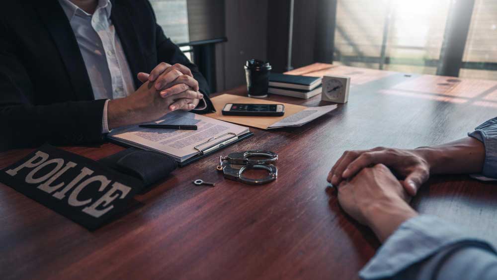 Client meeting with felony defense lawyer in Oklahoma regarding criminal charges 